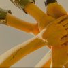 Teens stacking hands together
